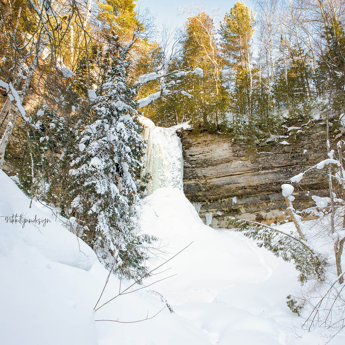 Munising Falls frozen waterfall in winter near Pictured Rocks National Lakeshore Michigan