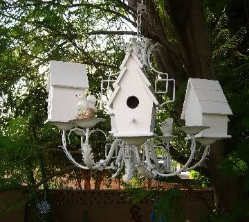 Chandelier Birdhouse & Feeding Station - What a wonderful way to recycle an old chandelier and give it new purpose.