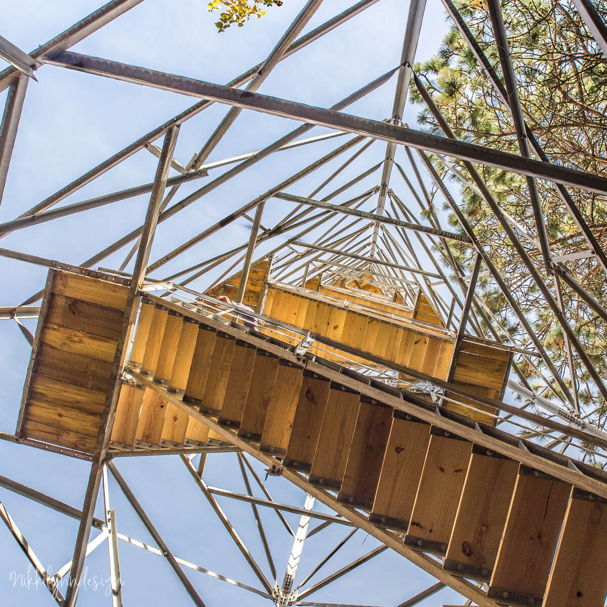 Looking up the stairs inside Mountain Fire Lookout Tower in Mountain Wisconsin