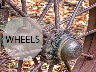 This image has an empty alt attribute; its file name is Rusty-Wheels.jpg